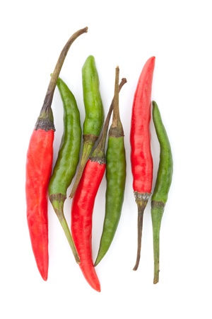Red and green chili peppers isolated on a white backgroundの写真素材