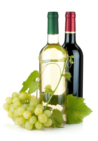 White and red wine bottles and grapes. Isolated on white backgroundの写真素材