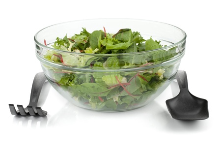Healthy green salad with plastic utensils. Isolated on white backgroundの写真素材