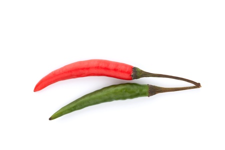 Red and green chili peppers isolated on a white backgroundの写真素材