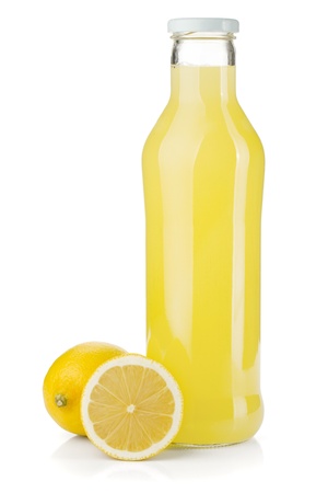 Bottle of lemon juice and fresh lemons. Isolated on white backgroundの写真素材