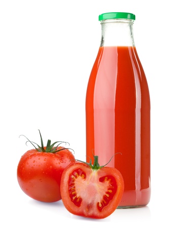 Bottle of tomato juice and ripe tomatoes. Isolated on white backgroundの写真素材
