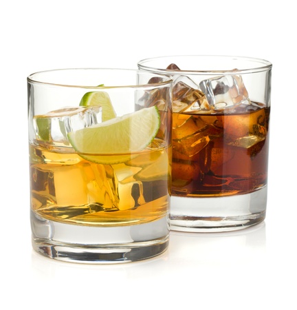 Whiskey and cola cocktails. Isolated on white backgroundの写真素材