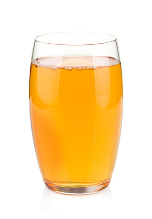 Apple juice in a glass. Isolated on white backgroundの写真素材