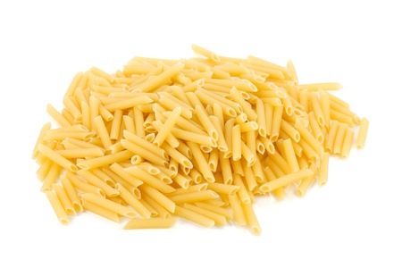 Heap of penne pasta. Isolated on white backgroundの写真素材