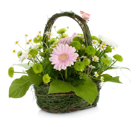 Bouquet of flowers in basket and butterfly. Isolated on white backgroundの写真素材
