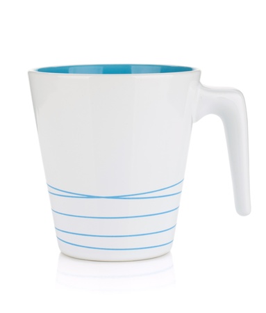 White mug, blue inside  Isolated on white backgroundの写真素材