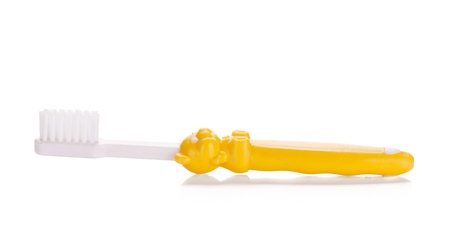 Baby toothbrush  Isolated on white backgroundの写真素材