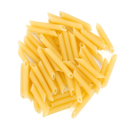 Heap of penne pasta. Isolated on white backgroundの写真素材