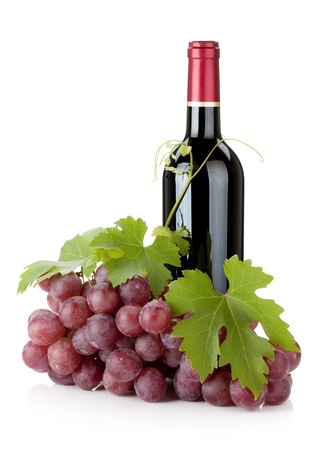 Red wine bottle and grapes. Isolated on white backgroundの写真素材