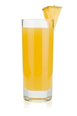 Pineapple juice in a glass. Isolated on white backgroundの写真素材