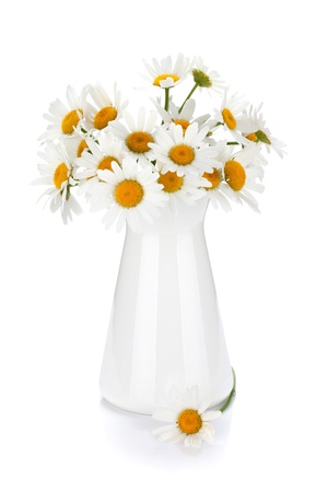 Chamomile bouquet in vase  Isolated on white backgroundの写真素材