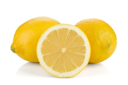 Two and half ripe lemons. Isolated on white backgroundの写真素材