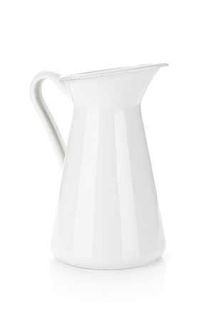 White metal milk pitcher. Isolated on white backgroundの写真素材