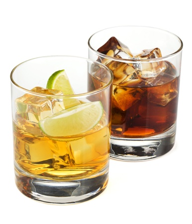 Whiskey and cola cocktails. Isolated on white backgroundの写真素材