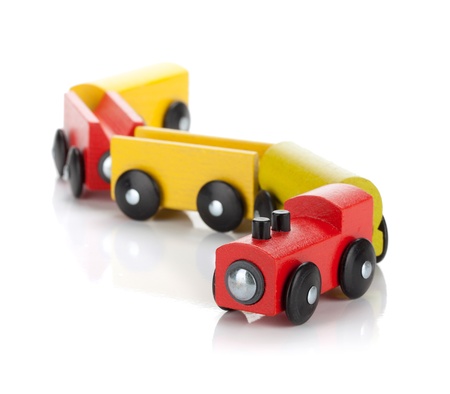Wooden toy colored train  Isolated on white backgroundの写真素材