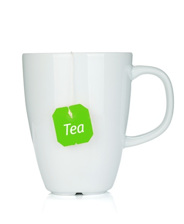 White tea cup with teabag. Isolated on white backgroundの写真素材