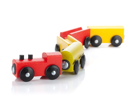 Wooden toy colored train  Isolated on white backgroundの写真素材