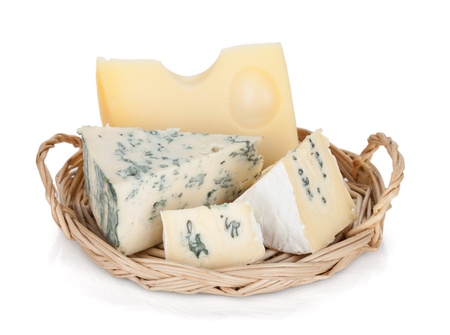Various types of cheeses. Isolated on a white background.の写真素材