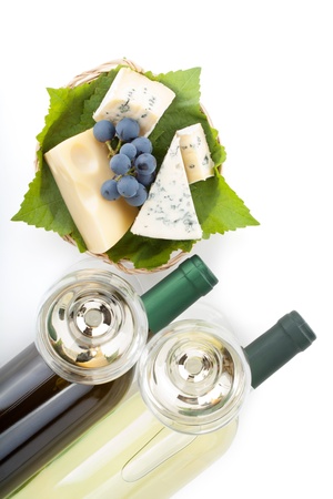 White wine, cheese and grape. Closeup. View from above. Isolated on white backgroundの写真素材