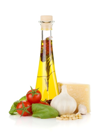 Olive oil, cherry tomatoes, basil, garlic and parmesan. Isolated on white backgroundの写真素材
