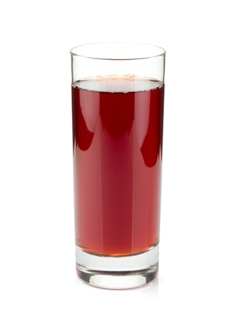 Pomegranate juice in a glass. Isolated on white backgroundの写真素材