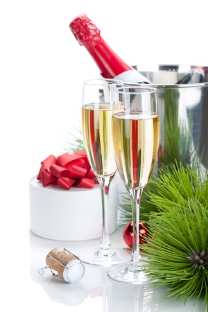 Champagne and christmas gift. Isolated on white backgroundの写真素材