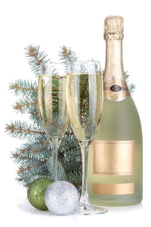 Champagne glasses, bottle, baubles and fir tree  Isolated on white backgroundの写真素材
