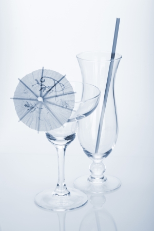 Two cocktail glasses. Blue tonedの写真素材