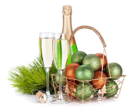 Champagne, firtree and christmas decor. Isolated on white backgroundの写真素材