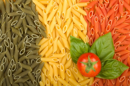 Pasta Italian flag texture with tomato and basilの写真素材