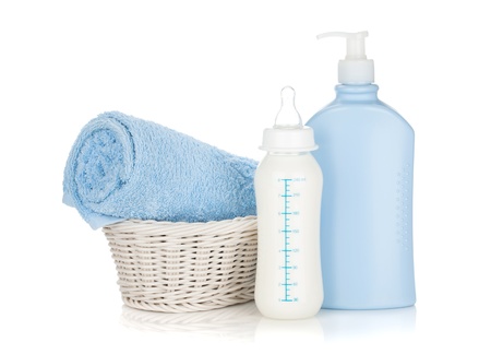 Baby milk bottle, shampoo and towel. Isolated on white backgroundの写真素材