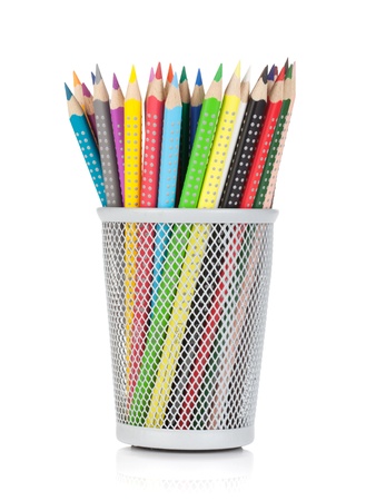 Various colour pencils in holder. Isolated on white backgroundの写真素材