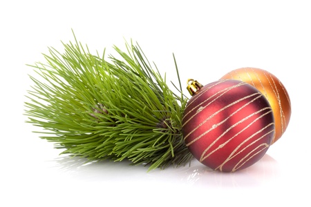 Christmas baubles and fir tree. Isolated on white backgroundの写真素材