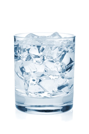 Glass of pure water with ice cubes. Isolated on white backgroundの写真素材