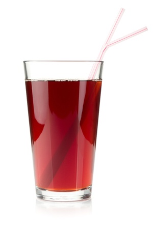 Pomegranate juice in a glass with two drinking straws  Isolated on white backgroundの写真素材