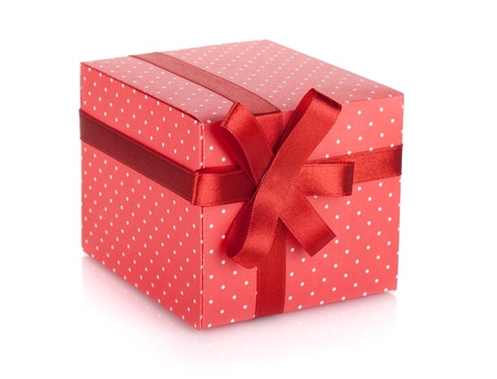 Red gift box with ribbon and bow  Isolated on white backgroundの写真素材