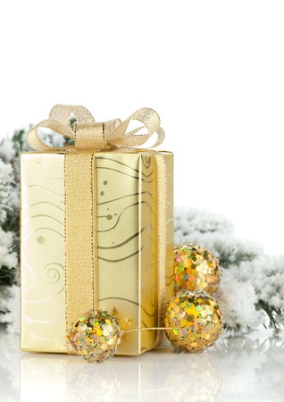 Gift box, christmas decor and snowy fir tree  Isolated on white backgroundの写真素材