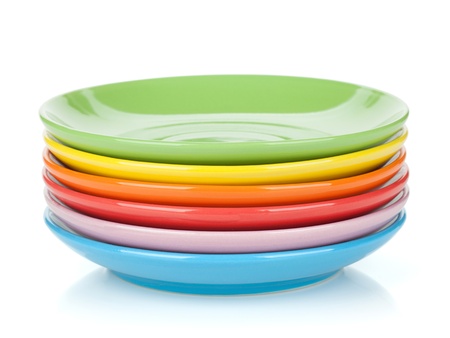 Set of colorful saucers. Isolated on white backgroundの写真素材