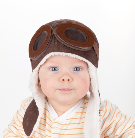 Closeup portrait of cute baby in funny helmetの写真素材