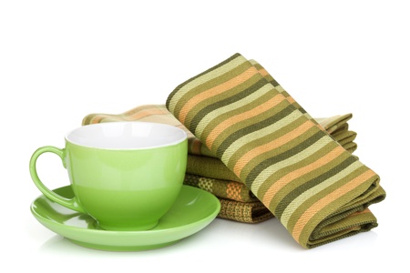 Coffee cup and kitchen towels. Isolated on white backgroundの写真素材