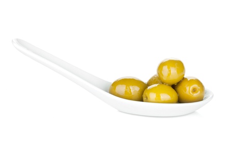 Green olives. Isolated on white backgroundの写真素材