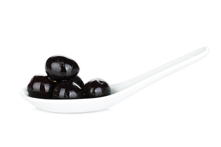 Black olives. Isolated on white backgroundの写真素材