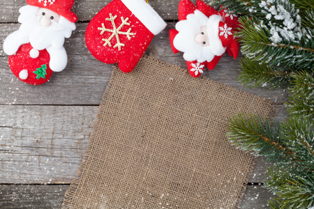 Christmas fir tree and decor on wooden table background with copy spaceの写真素材