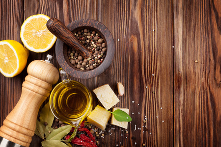 Various spices on wooden background. Top view with copy spaceの写真素材