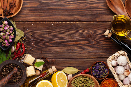 Various spices on wooden background. Top view with copy spaceの写真素材