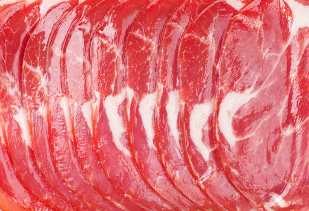Sliced prosciutto ham macro textureの写真素材