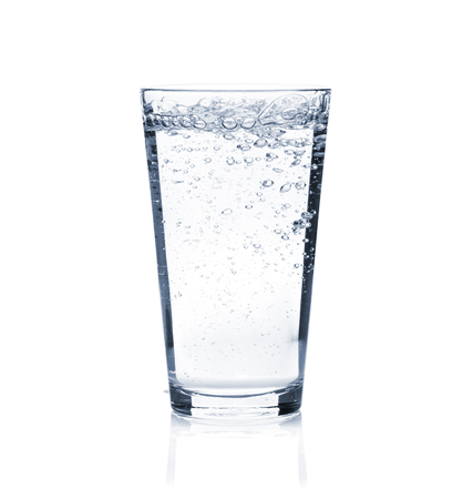 Glass of sparkling water. Isolated on white backgroundの写真素材