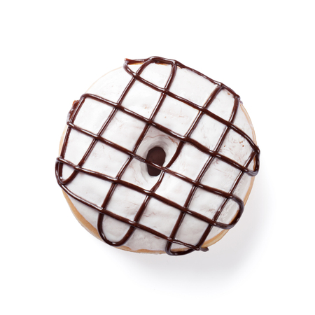 Donut with chocolate decor. Isolated on white backgroundの写真素材
