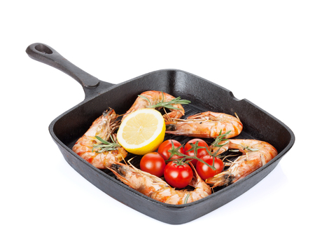 Grilled shrimps on frying pan. Isolated on white backgroundの写真素材